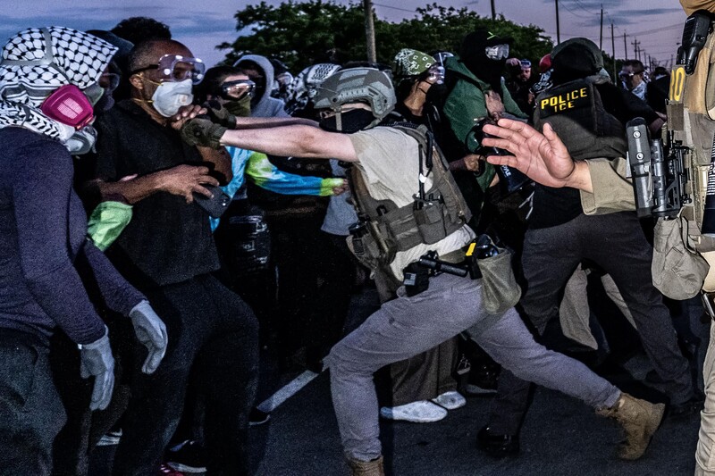 Clashes Outside Delaney Hall by Mark Peterson