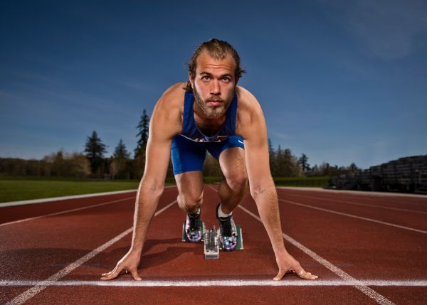 Bogdan Pavel, UBC Thunderbirds sprinter in the starting blocks.
