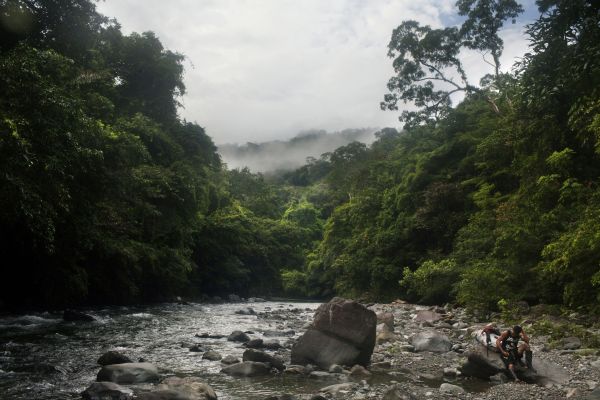 A porter rests in the Tuquesa river in Panama, May 18, 2017