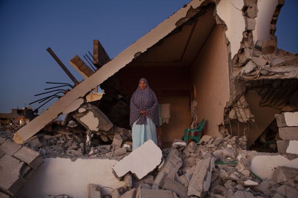 Sobheya Hamid Abu Mutlag, 59, poses at her home in Khan Yunis destroyed by Israeli artillery during the summer’s 50-day war between Israel and Hamas.