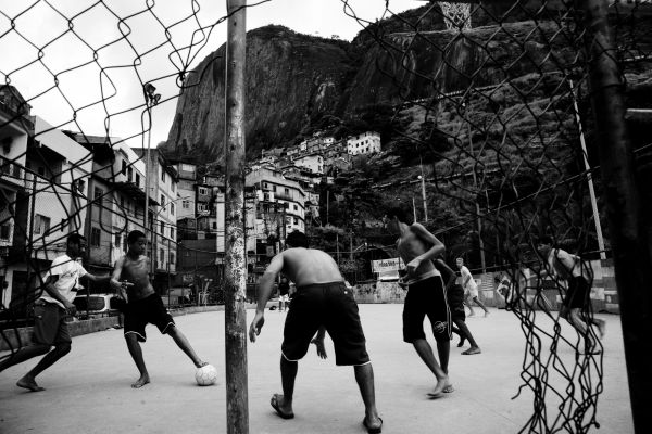 Teens play soccer in favela Rocinha. Rio, Brazil, Jan 27 2008.
