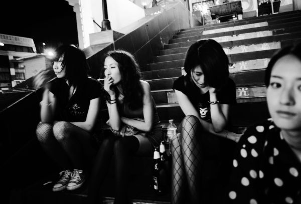 Chinese women hang out in famous/infamous night spot Kundu in Kunming, the capital of Yunnan province, as China’s massive economic development, as well as its migration, has created the outstanding gap between the rich and the poor in the recent years.