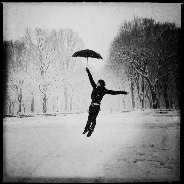 Dance in snowy Central Park. New York continuously experiences Polar Vortex related snow storm, yet some people, like Mike, enjoy it. He is an artist, but performs a dance more than hobby, Feb. 2014.