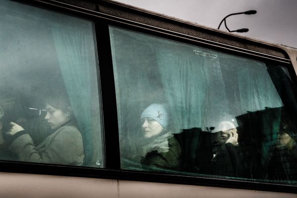 People on a bus leaving from the main bus station in Kyiv, Ukraine, Thursday, February 24, 2022.