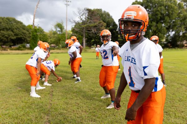 The Drew Eagles junior high football team practices after school at Drew-Hunter Middle School in Drew, Mississippi.