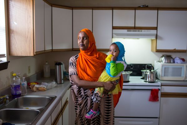 Somali refugee Malyun Sulieman with her daughter Ifrah, 18 months at the Garden Spot Apartments in Garden City, Kansas.