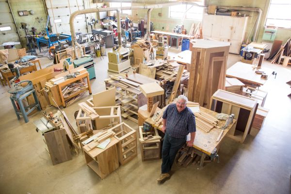 Industrial Technology teacher Mark Heier in the wood shop at Wheatland High School which teaches 47 students in Grainfield, Kansas.