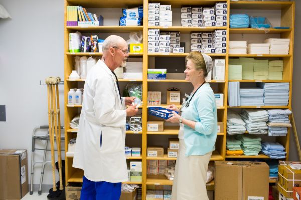 Dr. Michael Machen MD speaks with Nurse Deb Bauman, RN at Bluestem Medical in Quinter, Kansas.