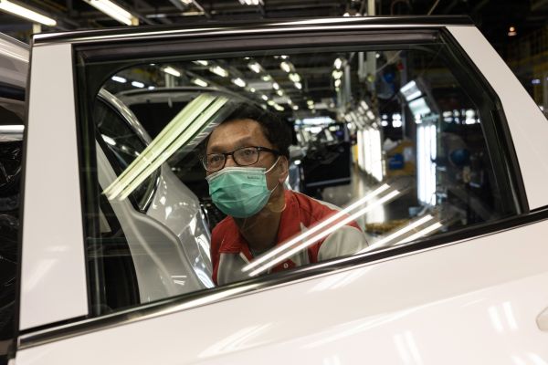 Quality inspection of a fully assembled Haval H6 Hybrid SUV model on the assembly line for Great Wall Motors Ltd at the company's plant in Rayong.