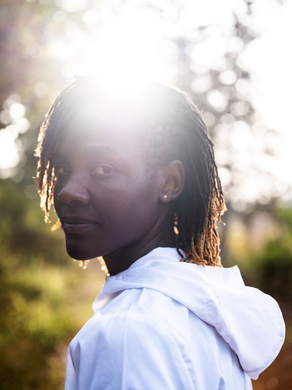 Portrait of Joan Chelimo after finishing an 8km training run through the forest in Iten, Kenya, on March 7, 2023.