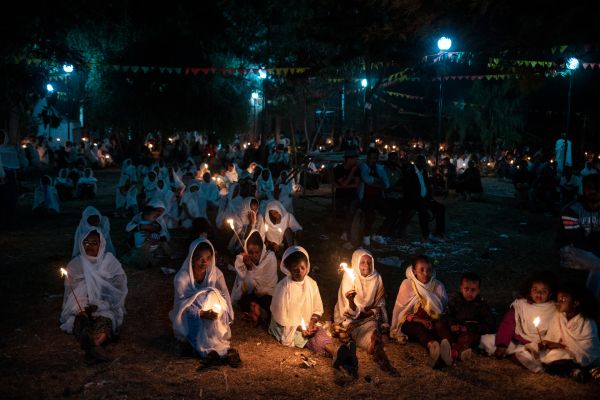 People gather to celebrate Timkat, the Ethiopian Orthodox Church's celebration of Jesus Christ's baptism, in Hawassa, Ethiopia, on January 19, 2018.