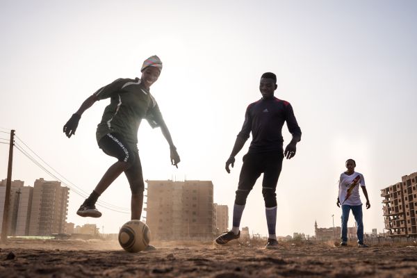 Members of Sudan’s first ever women’s club football league, including goalkeeper for league team Eltahadi Huda Ali (28), during a co-ed training on a dirt field on the outskirts of Khartoum, Sudan, on February 9, 2020.