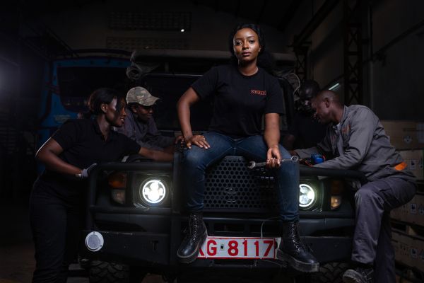 Portrait of mechanical engineer Esther Wairimu, 25, as the Roam team works on a battery system for an electric converted Land Cruiser in for a scheduled maintenance in Roam’s research and development facility works in Nairobi, Kenya, on May 5, 2021.