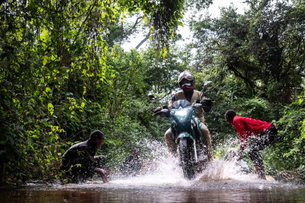 Scouts John Chege and Amos Mbuthi Kimani patrol Karura Forest, the city’s largest green area, with electric motorbikes in Nairobi, Kenya, on May 7, 2021.