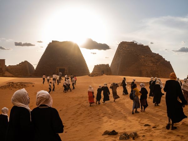 A haboob, or sandstorm, followed by a thunderstorm, rolls across the Meroë pyramids, Sudan, during a visit by a group of schoolchildren organized by “For Education” local youth volunteers, on August 3, 2021.