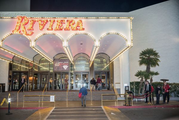 A man walks in to the valet entrance to the hotel. The Riviera Hotel and Casino, which opened in 1955, will be shut down permanently on May 4, 2015 and the building imploded in late summer 2015.