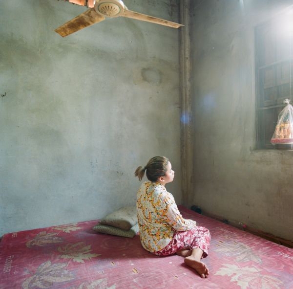 LOR Rath, 21, photographed at her parents homea pagoda in Phnom Pehn, Cambodia.