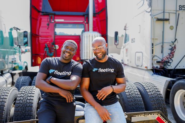 Pierre Laguerre, founder and CEO of Fleeting, is photographed with his friend and employee Terrell Hall, a formerly incarcerated individual who is not only getting his commercial drivers license, but will be leading a program to help others like him get licensed and ready to work in the trucking industry.