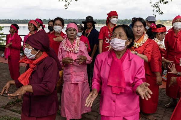Local women dance during the parade of the annual Bun Bang Fai festival in Chaiburi town. Bun Bang Fai, or the Rocket Festival, is an annual event held in Northeastern Thailand.