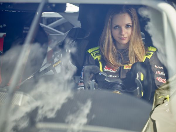Aurora Straus at the Palm Beach International raceway with her BMW M4 GT4 racecar.