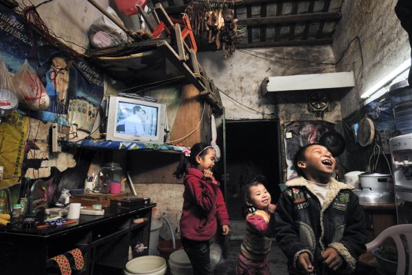A one room home in one of Shenzhen's many urban villages, where migrants gather and, instead of returning to the countryside, seek to settle.