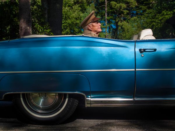 Wearing his World War Two army uniform, 104 year-old John (Jack) Gardner Talcott Jr. takes the parade seat of his Cadillac convertible at his home at Talcott Pines in Plymouth, Massachusetts.